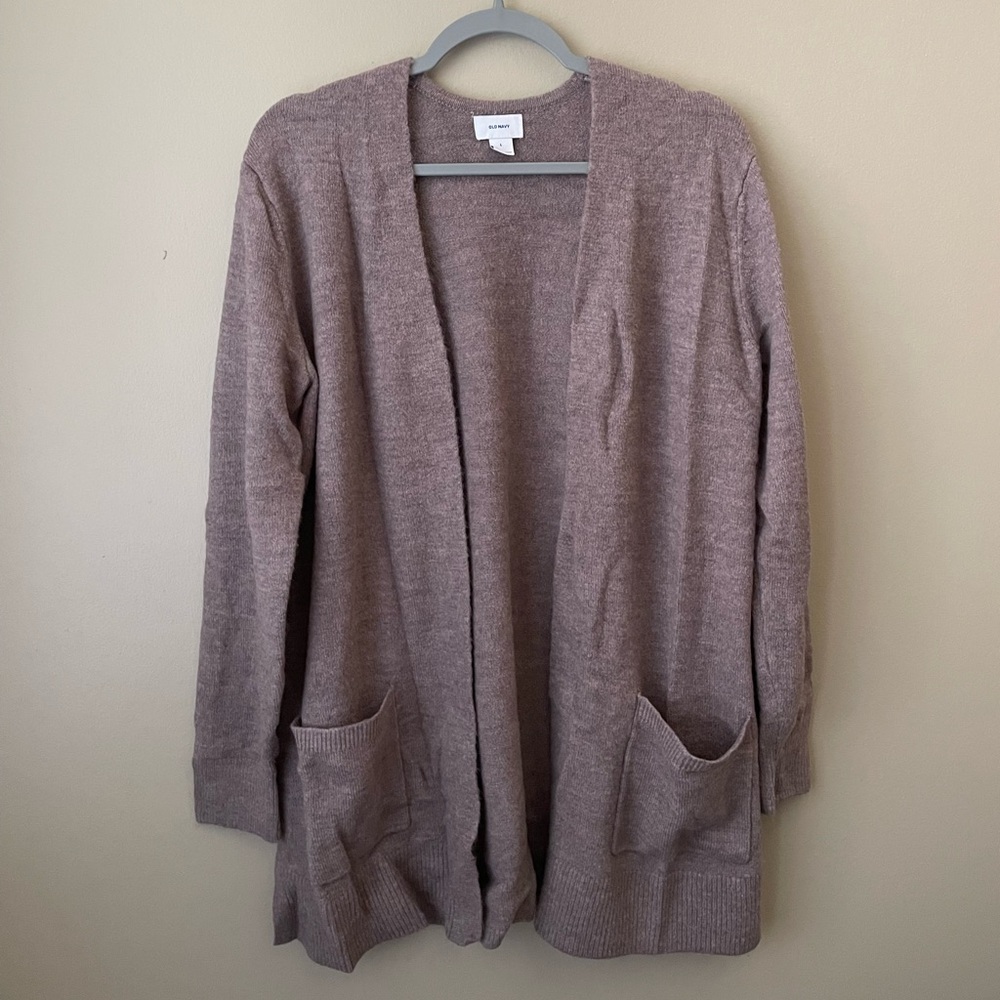 Large open cardigan sweater, beige with pink undertones. Long, oversized. Warm